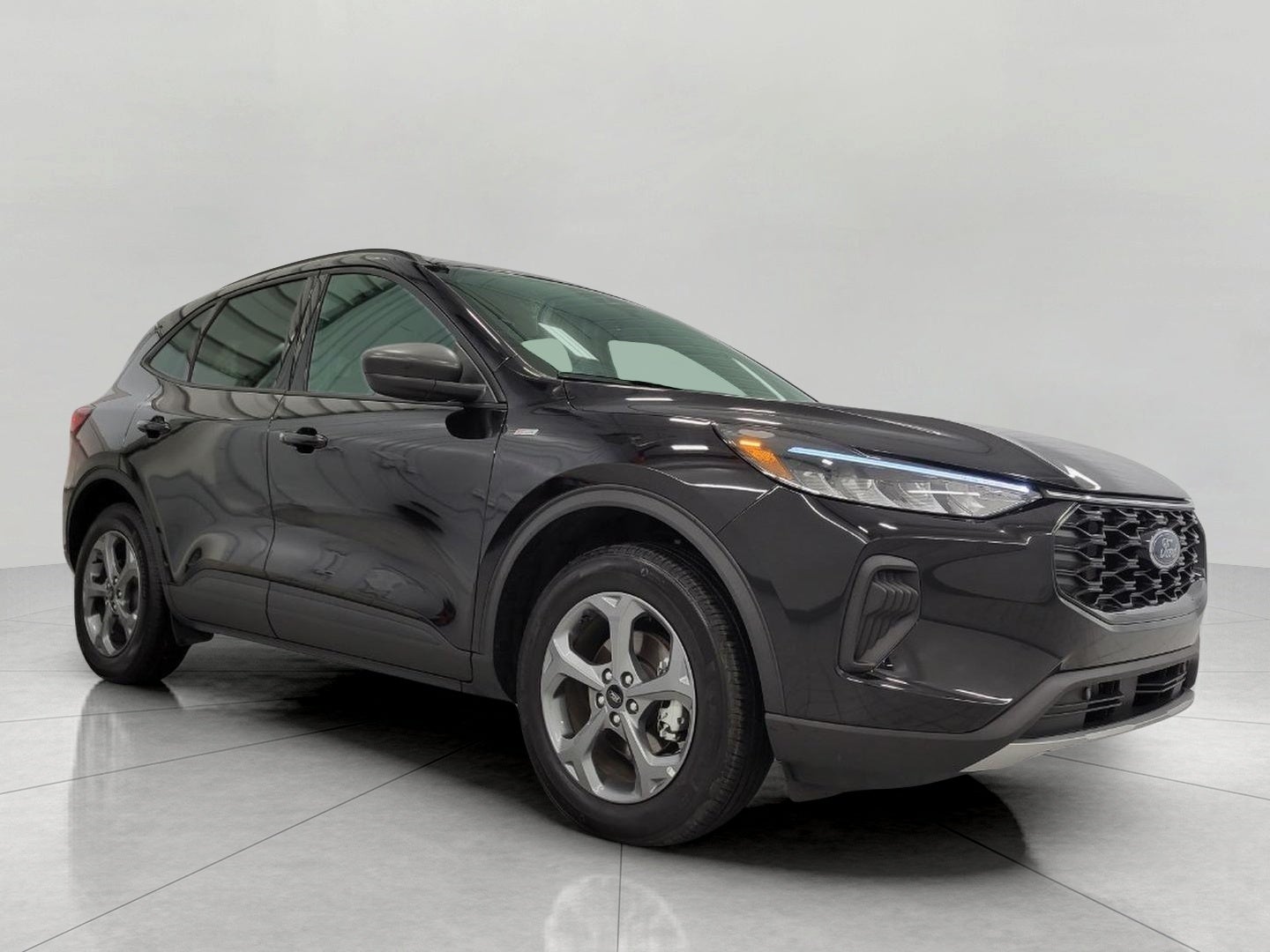 2025 Ford Escape ST-Line AWD in Carbonized Gray Metallic — front three-quarter view