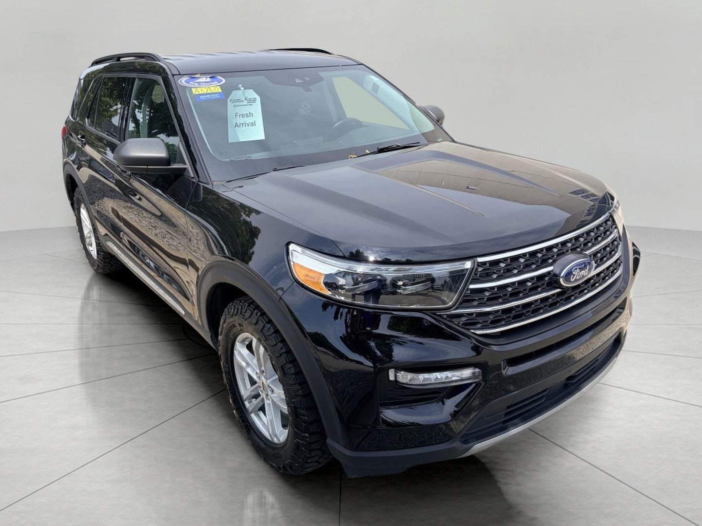2024 Ford Explorer XLT 4WD in Agate Black Metallic — front three-quarter view
