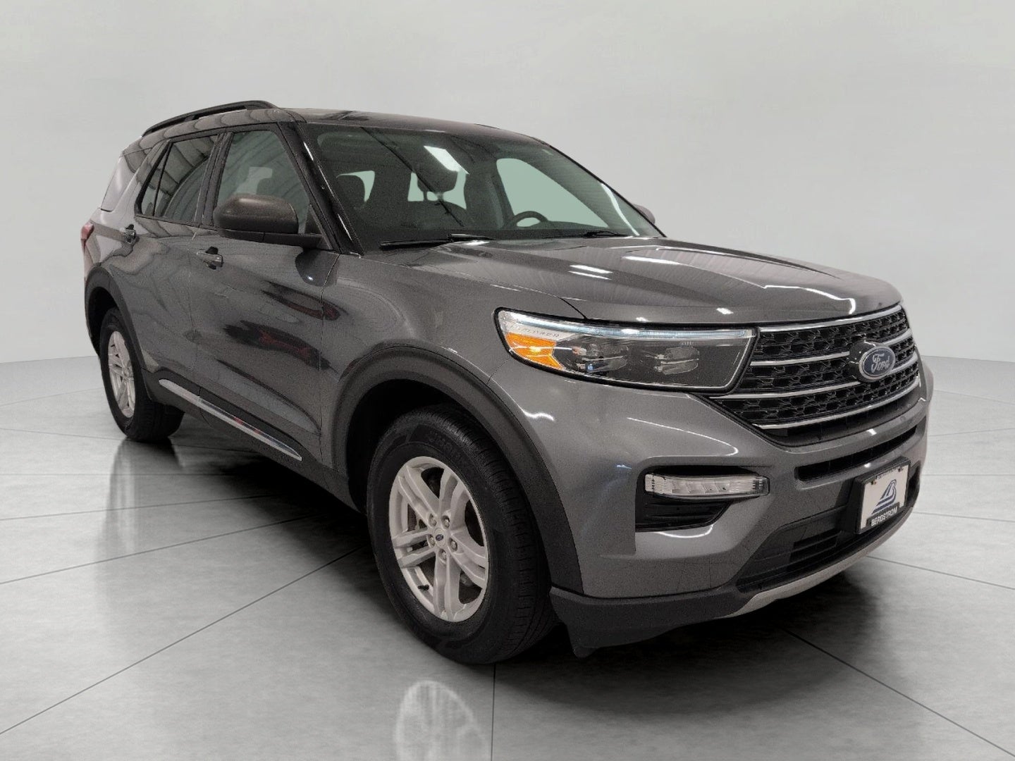 2024 Ford Explorer XLT 4WD in Carbonized Gray Metallic — front three-quarter view