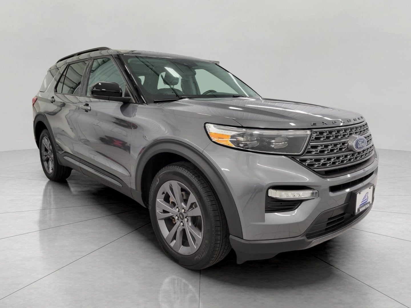 2023 Ford Explorer XLT 4WD in Carbonized Gray Metallic — front three-quarter view