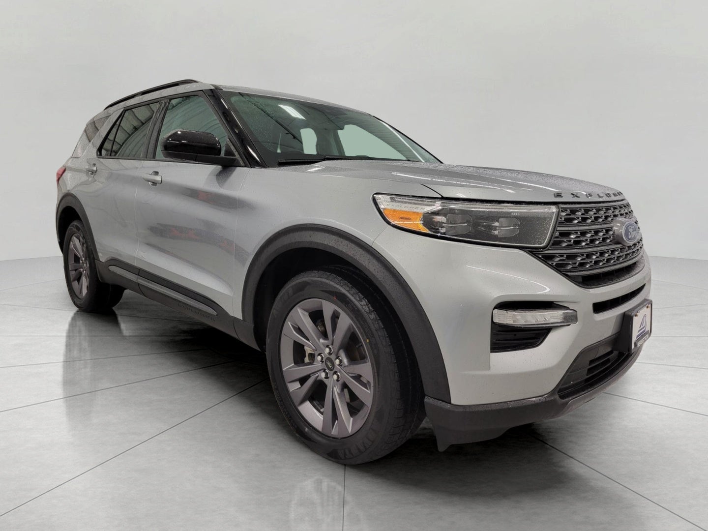 2024 Ford Explorer XLT 4WD in Iconic Silver Metallic — front three-quarter view