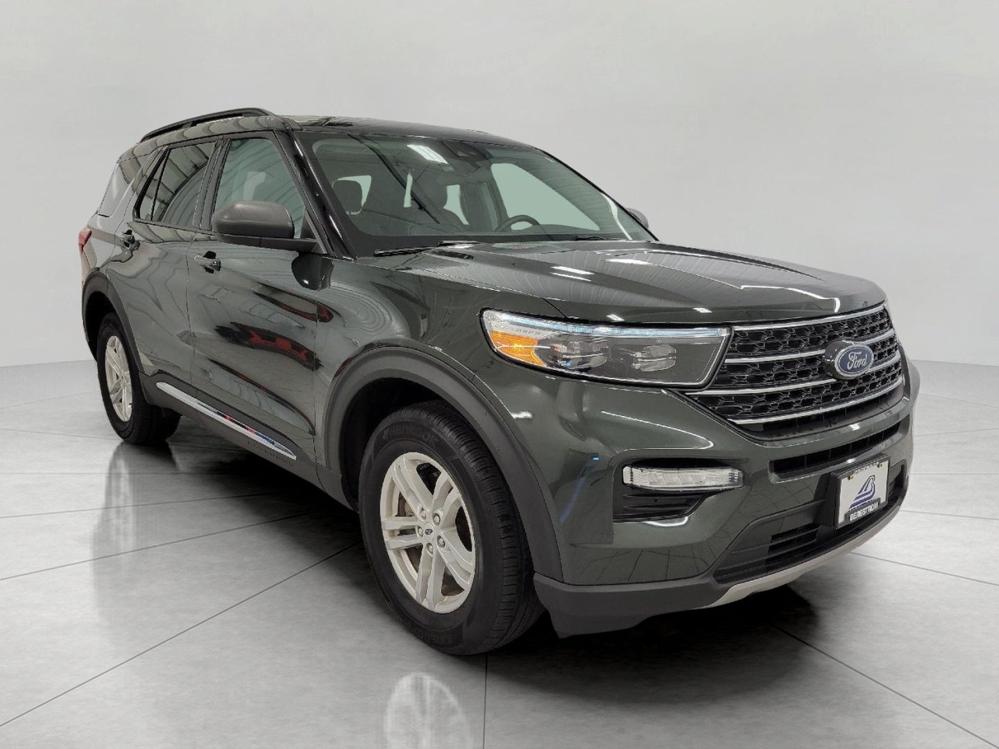 2024 Ford Explorer XLT 4WD in Forged Green Metallic — front three-quarter view
