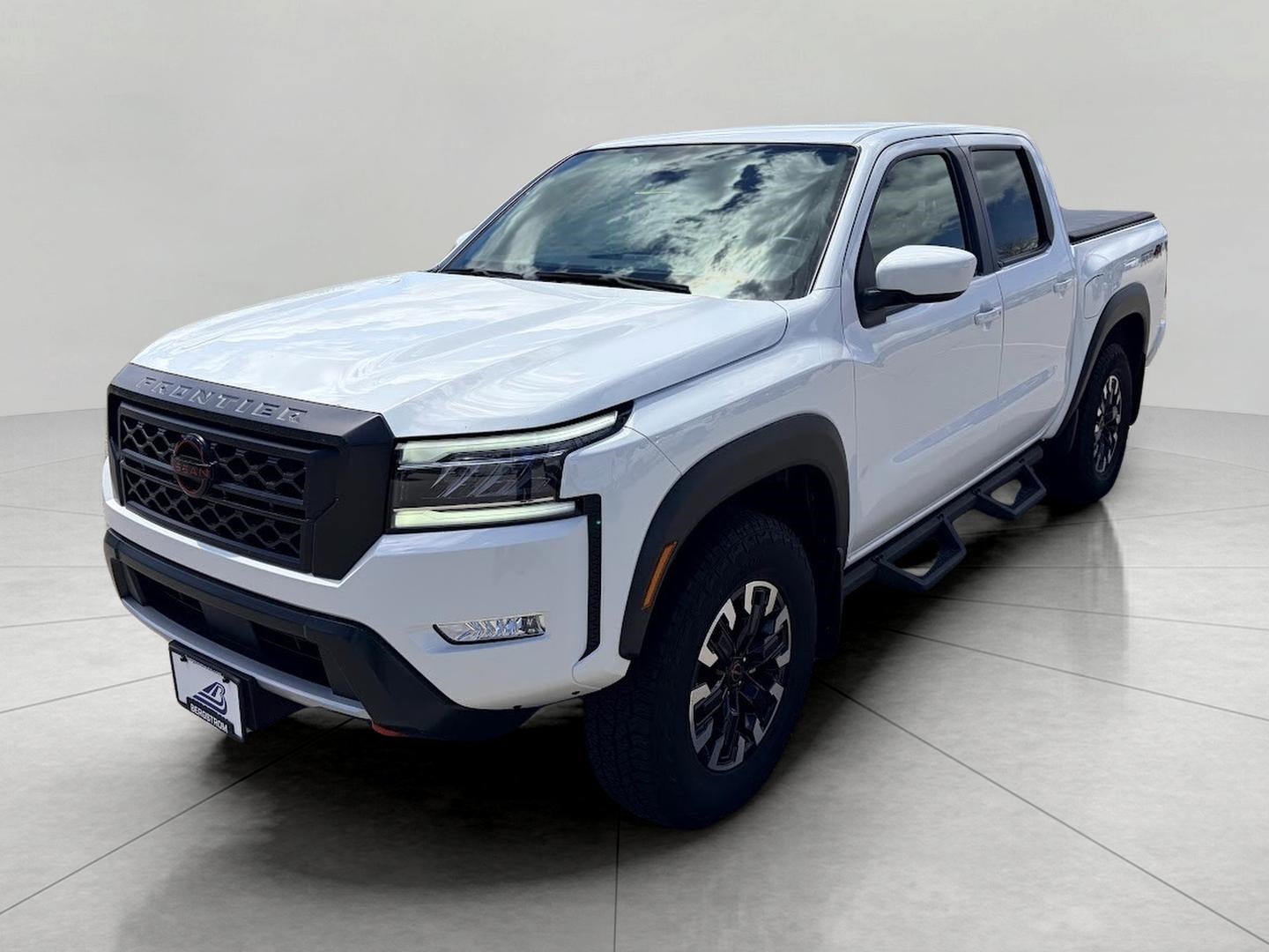 2024 Nissan Frontier — rear three-quarter view