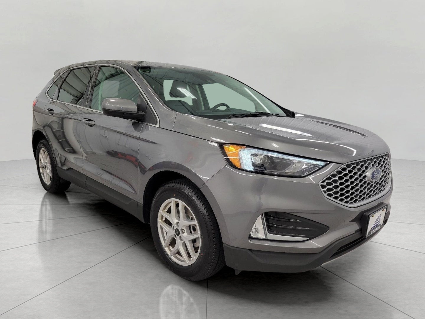 2024 Ford Edge SEL AWD in Carbonized Gray Metallic — front three-quarter view