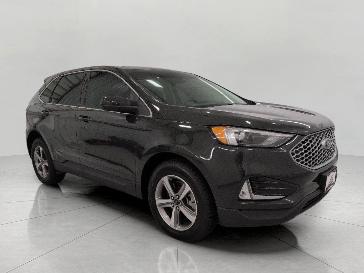 2024 Ford Edge SEL AWD in Forged Green Metallic — front three-quarter view
