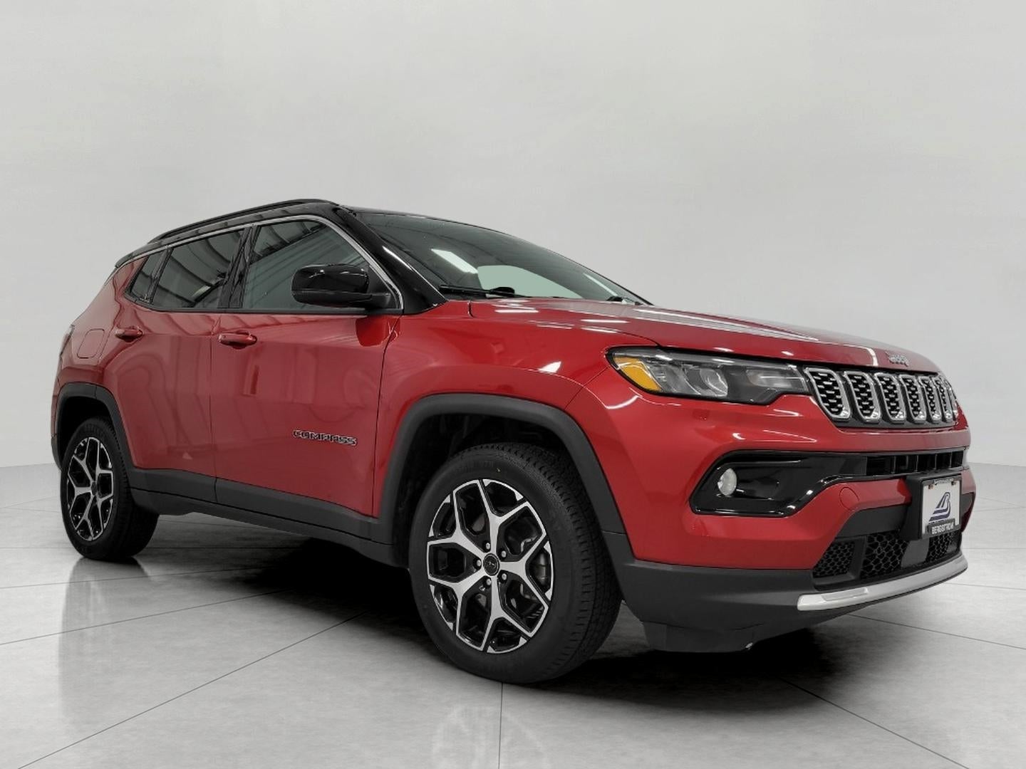2025 Jeep Compass Limited 4x4 in Red Hot Pearlcoat — front three-quarter view