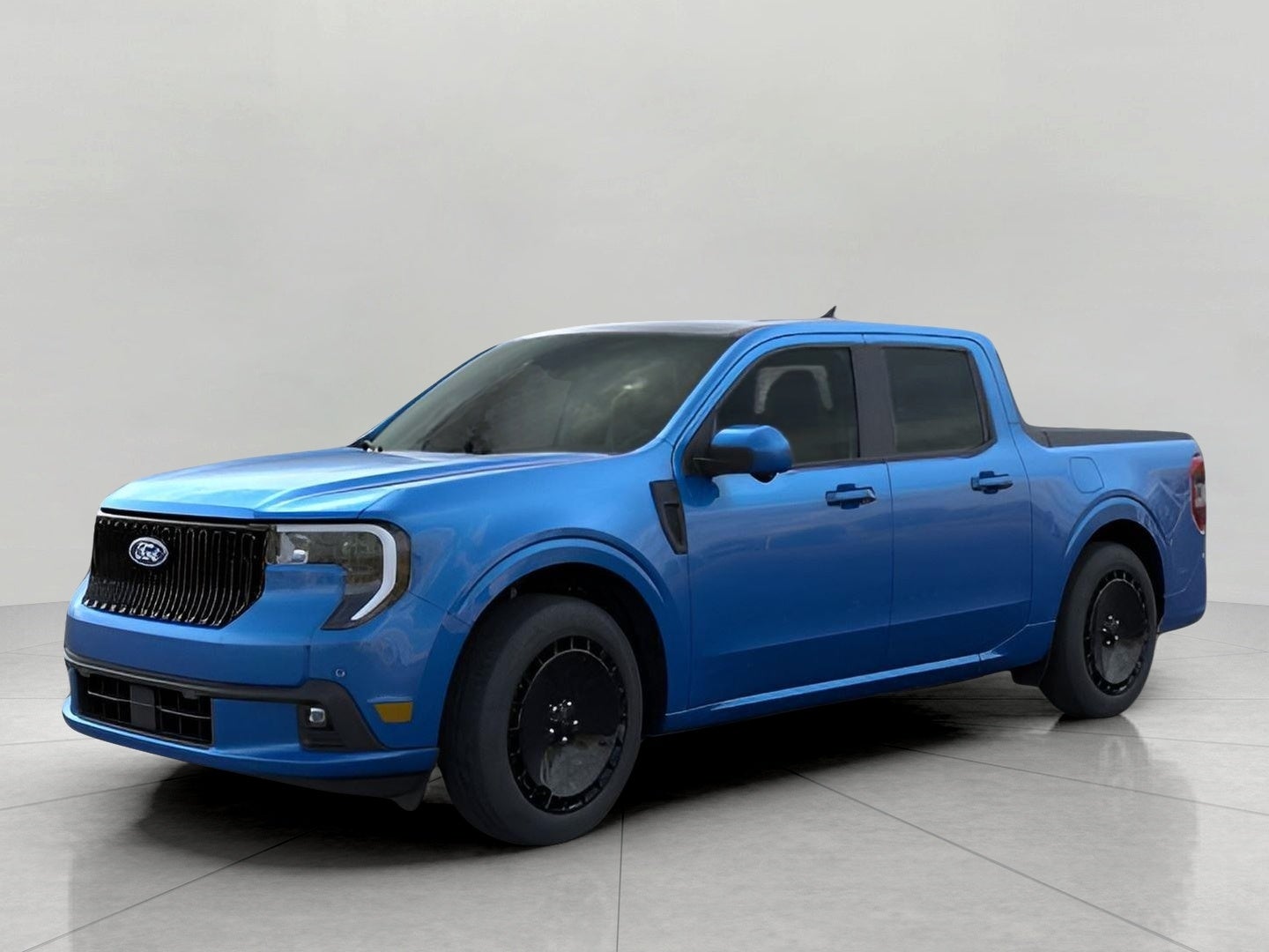 2026 Ford Maverick Lobo High AWD SuperCrew in Velocity Blue — front three-quarter view