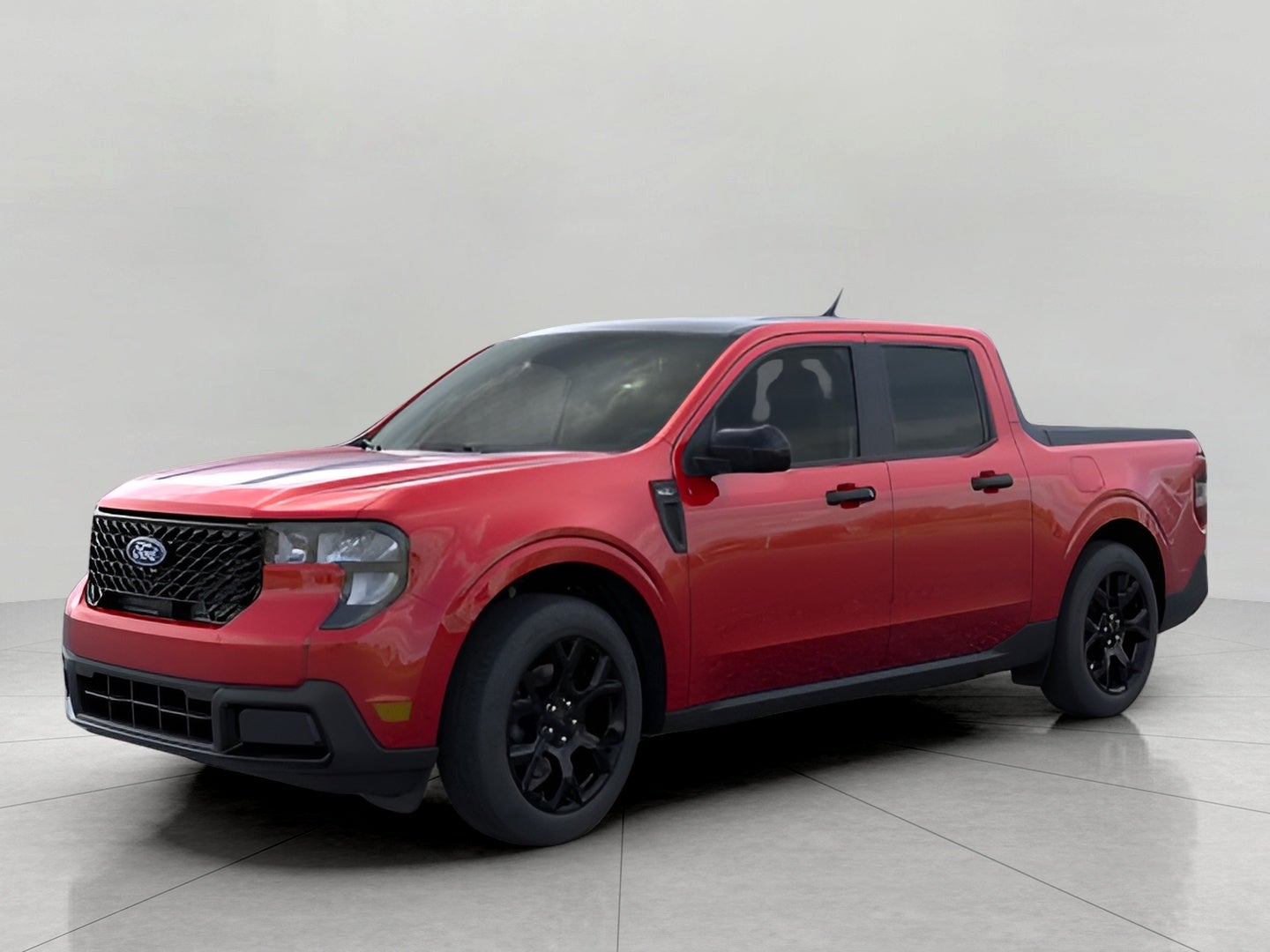 2026 Ford Maverick XLT AWD SuperCrew in Ruby Red Metallic Tinted Clearcoat — front three-quarter view
