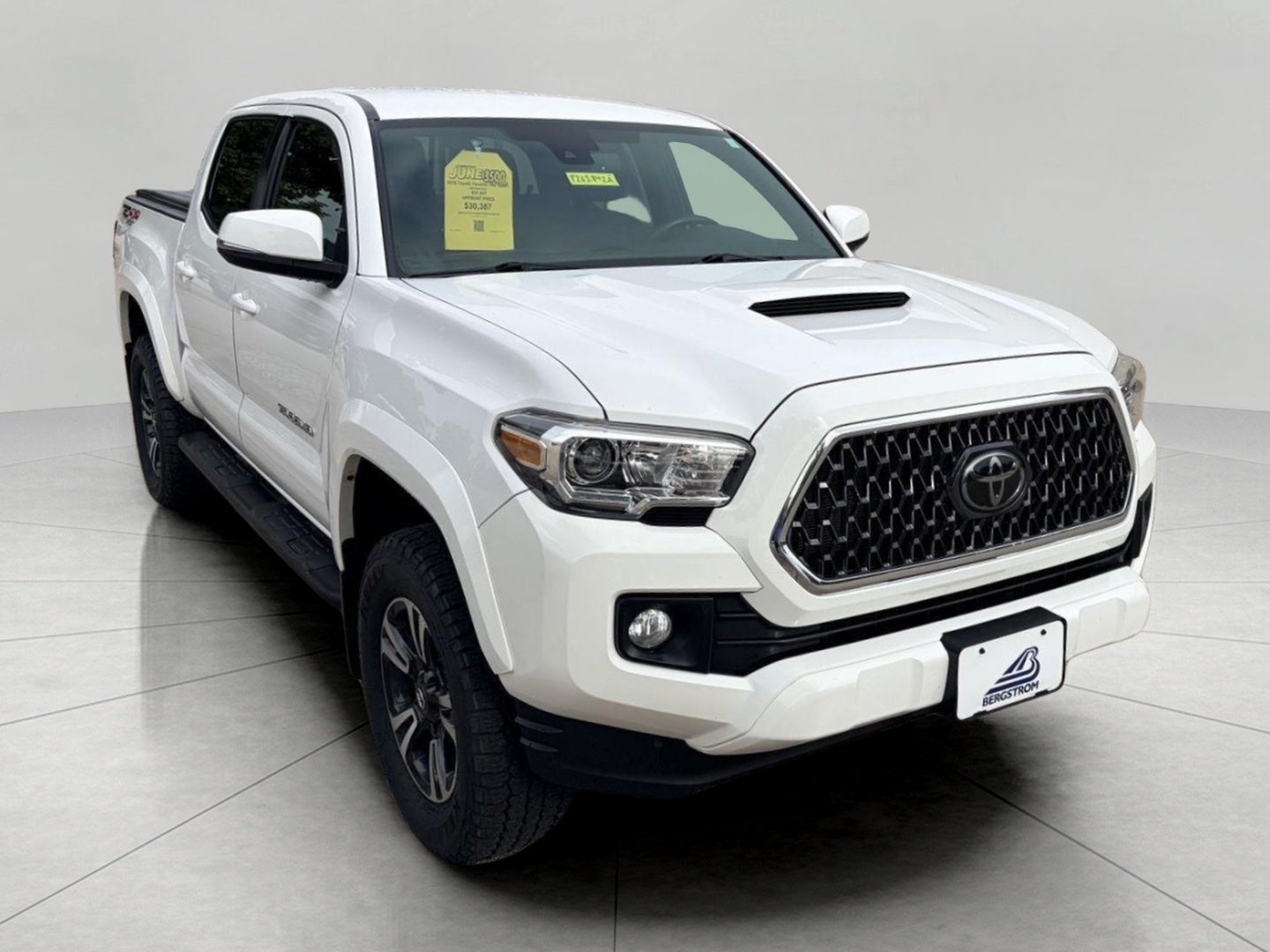 2018 Toyota TACOMA TRD SPORT in Super White — front three-quarter view