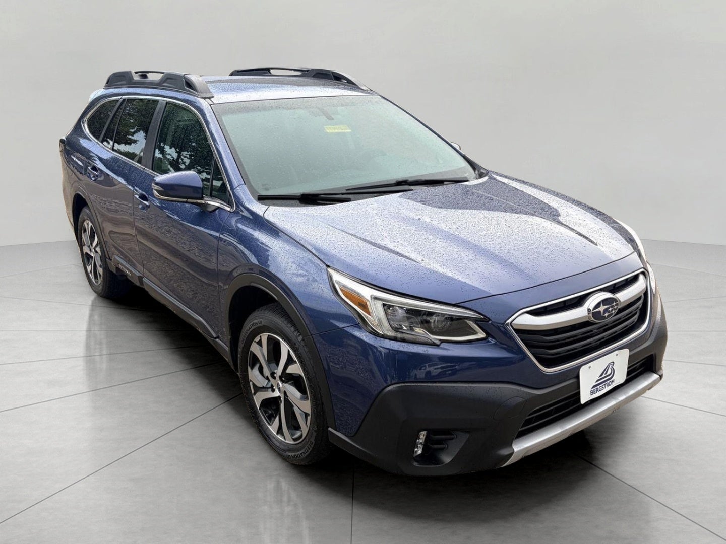 2021 Subaru Outback Limited CVT in Abyss Blue Pearl — front three-quarter view